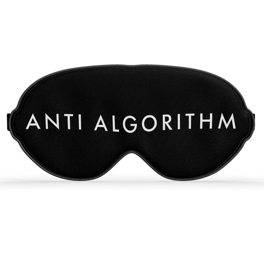 Front view of a black eye mask with white ANTI ALGORITHM lettering