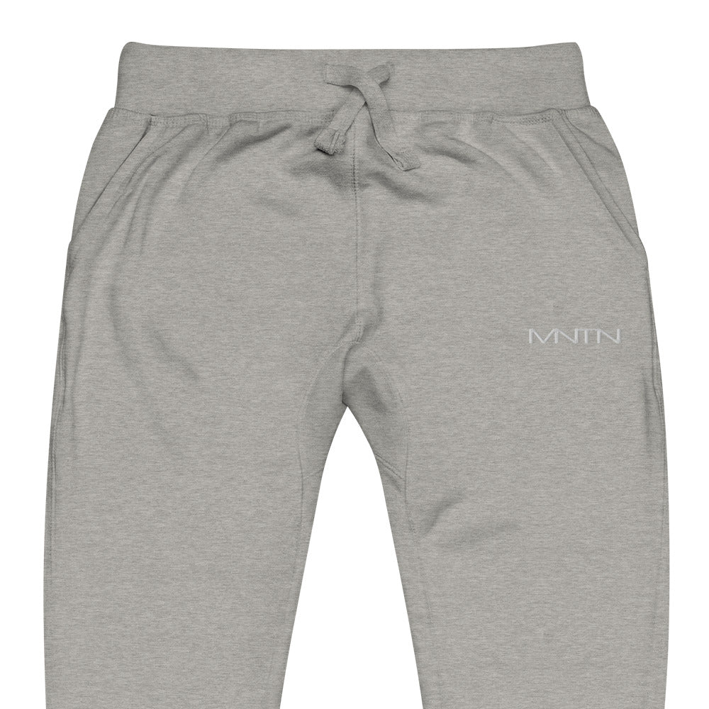 MNTN Fleece Sweatpants in Carbon Grey — logo detail