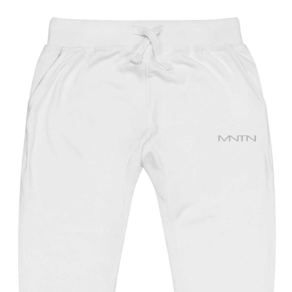 MNTN Fleece Sweatpants in White — logo detail